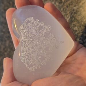 Engraved selenite palm stone